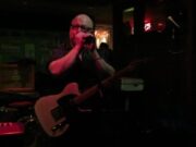 screenshot of Black Francis/Frank Black/Charles addressing the intimate audience